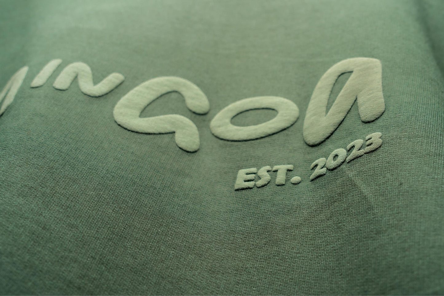 Born in Goa Essentials | Puff Print Unisex Fit Bottle Green